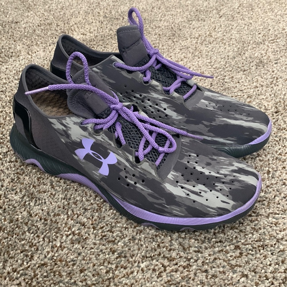 Gray and purple Under armour running shoes